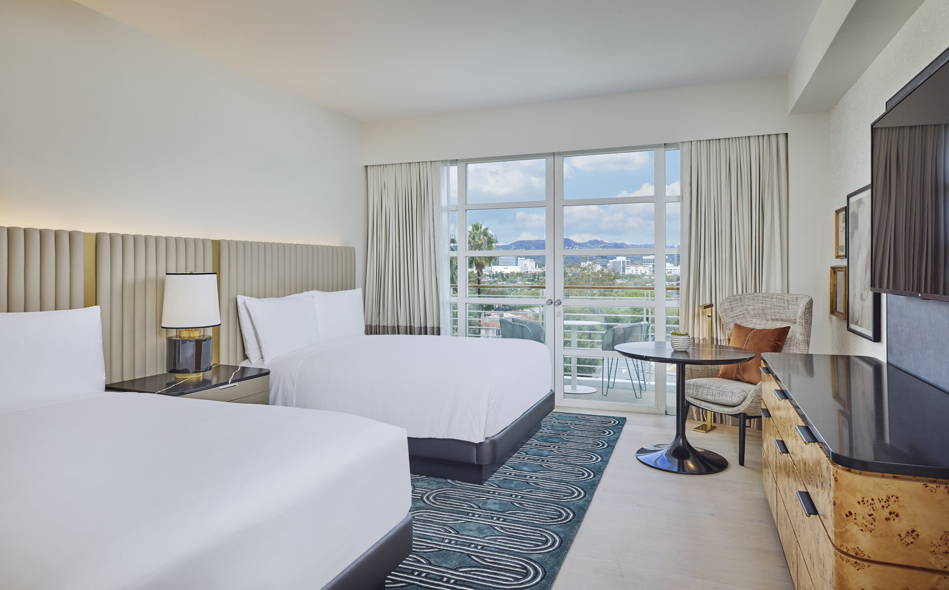 Luxury recovery suite with balcony and Beverly Hills view